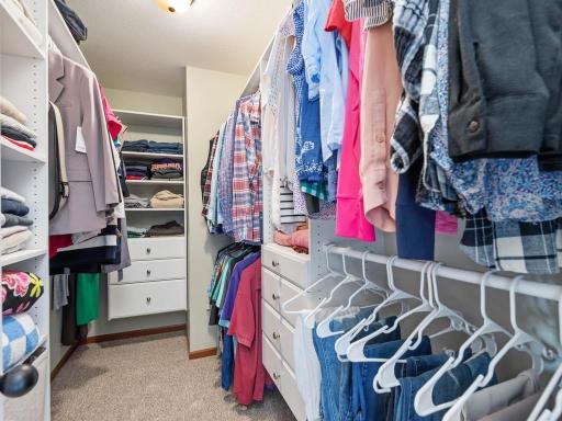 Large primary closet with custom built ins