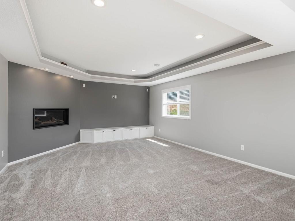 Lower level fireplace with lower built in's