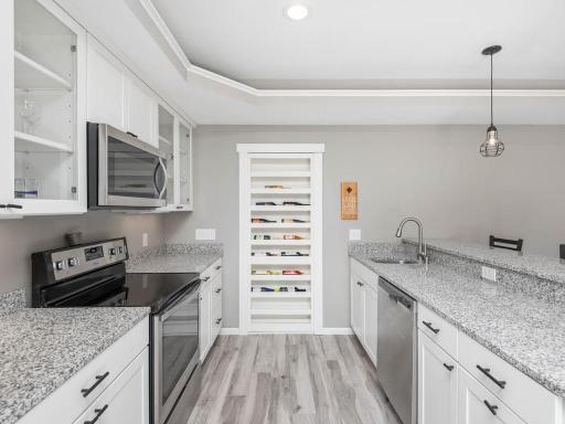 Bar/kitchen. That great wine rack is actually a door to access the mechanical room