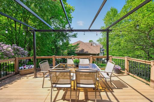 Spacious maintainence-free deck with retractable sunshade