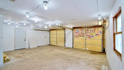 The 2 car garage is heated and insulated. The doors are 9' wide x 7' high.