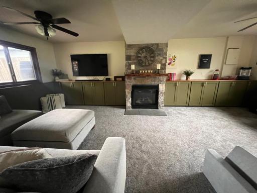Lovely family room with a gas fireplace and built-in cabinets