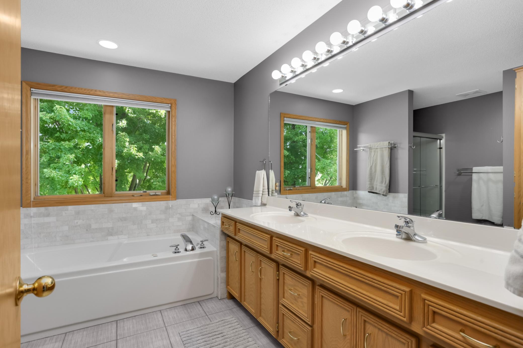 So much storage in just this vanity, but there is also a built in linen closet to the left.