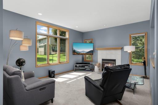 The sunken family room is spacious but cozy thanks to the gas fireplace and large south and west facing windows.