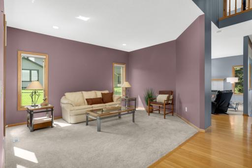 Over sized windows throughout this home keep it bright and welcoming throughout the day.