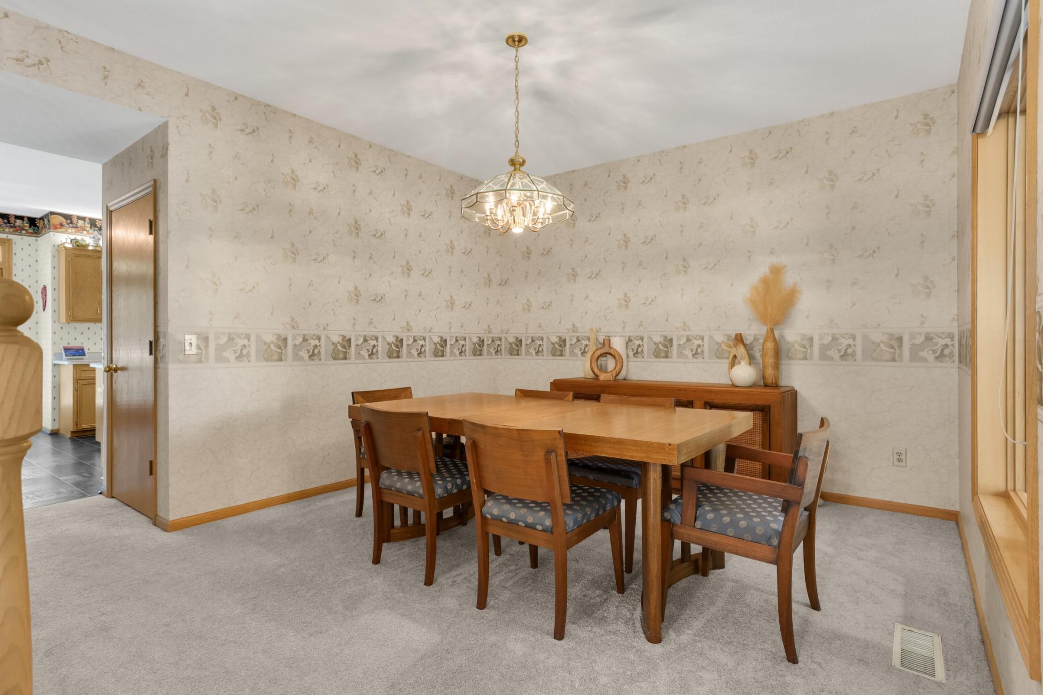 This space would make a great den, office or play area if not needed for formal dining.