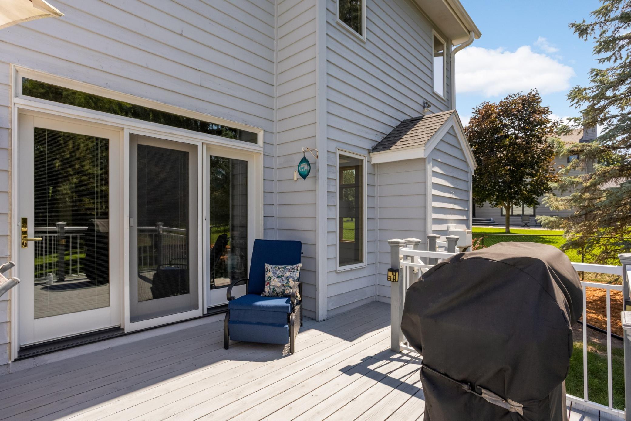 Peaceful and quiet with a great mix of sun and shade on this spacious deck.
