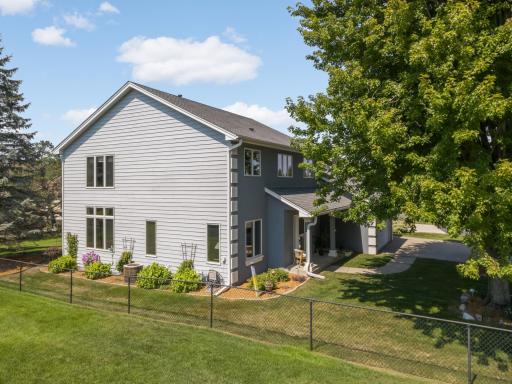 Refreshed landscaping and oversized windows add to the appeal of this home.