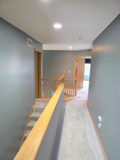 Second "hidden" staircase conveniently leads directly into the kitchen and laundry area
