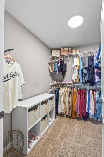 renovated primary closet with updated light fixture to show daylight and next is nightlight