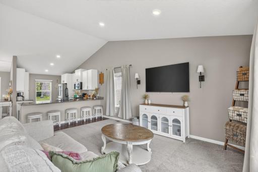 65" TV with plenty of room to install bigger between accent light fixtures