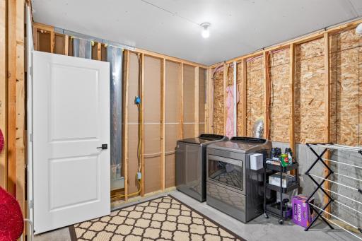 lower level laundry - you could make this the most adorable laundry room. So much potential