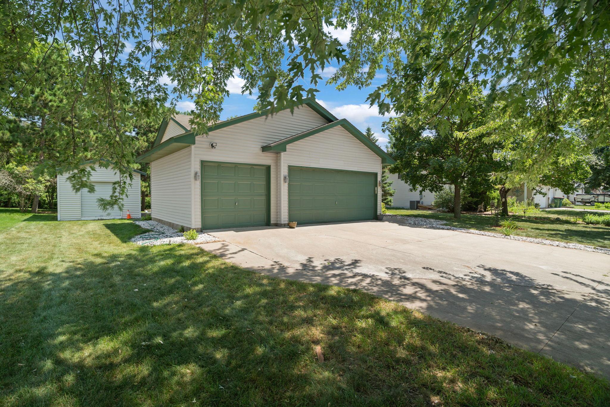 A spacious three-car garage provides plenty of room for vehicles, storage, and everyday convenience.