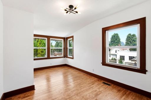 Filled with natural light and thoughtfully designed, the primary bedroom offers a relaxing atmosphere, a spacious layout, and the convenience of a private en-suite bathroom.