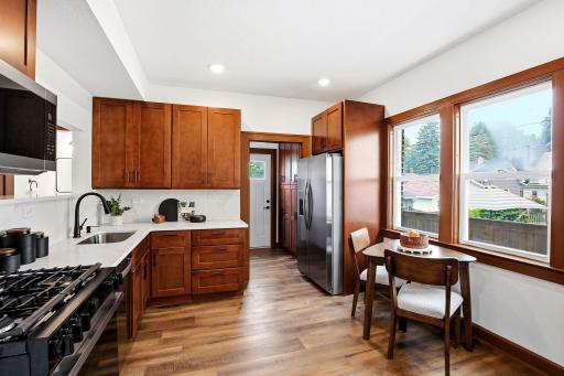 Beautifully designed with both style and functionality in mind, this brand-new kitchen features modern cabinetry, elegant countertops, stainless steel appliances, and plenty of space to cook, gather, and create lasting memories with family & friends