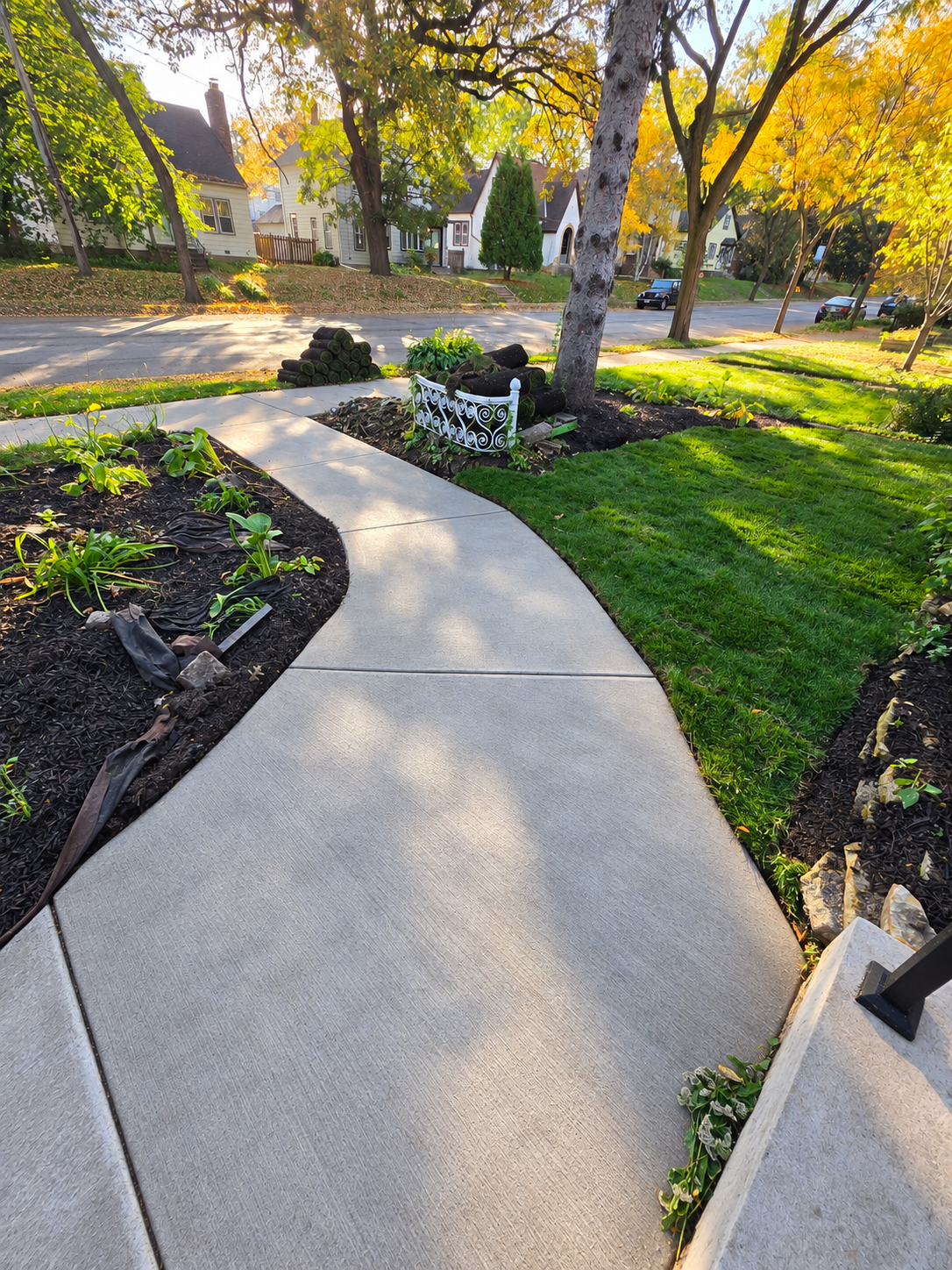The owner made a substantial additional investment in the outdoor spaces, adding new concrete in the front and back yards, fresh soil and sod, and refreshed garden beds. response to showing feedback.
