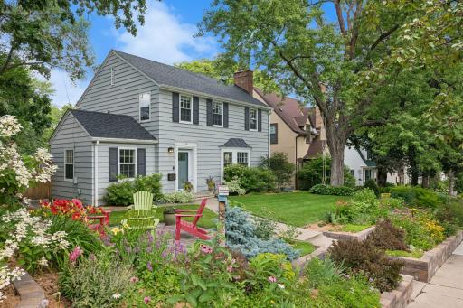Timeless two-story Colonial with extensive updates on an oversized, professionally landscaped lot in desirable Tangletown.