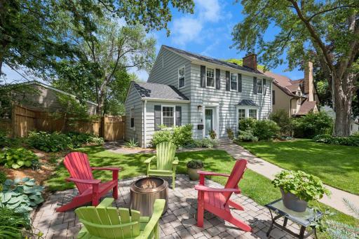 Timeless two-story Colonial with extensive updates on an oversized, professionally landscaped lot in desirable Tangletown.
