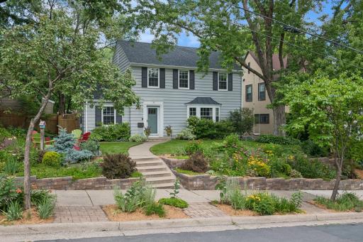 Timeless two-story Colonial with extensive updates on an oversized, professionally landscaped lot in desirable Tangletown.