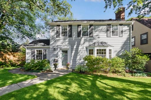 Timeless two-story Colonial with extensive updates on an oversized, professionally landscaped lot in desirable Tangletown.