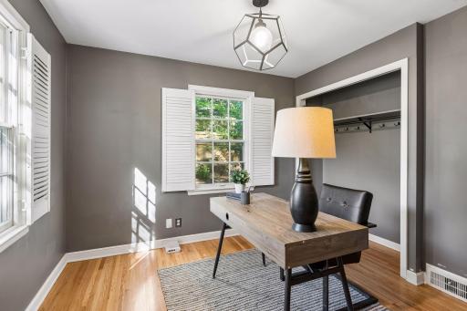 Main level bedroom is excellent flex space, currently used as office.