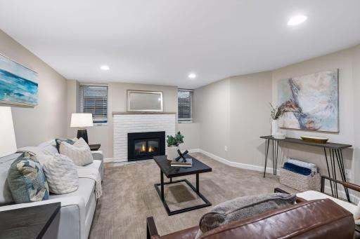 Beautifully remodeled basement features a wet bar, an additional full bathroom, a spacious family room, and another flexible space that works as an office, workout room, or nonconforming 5th bedroom.