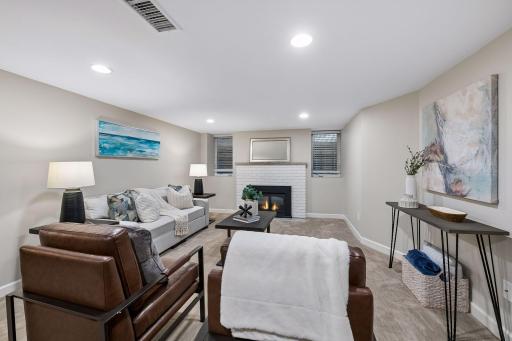 Beautifully remodeled basement features a wet bar, an additional full bathroom, a spacious family room, and another flexible space that works as an office, workout room, or nonconforming 5th bedroom.