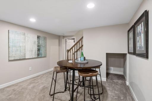 Beautifully remodeled basement features a wet bar, an additional full bathroom, a spacious family room, and another flexible space that works as an office, workout room, or nonconforming 5th bedroom.