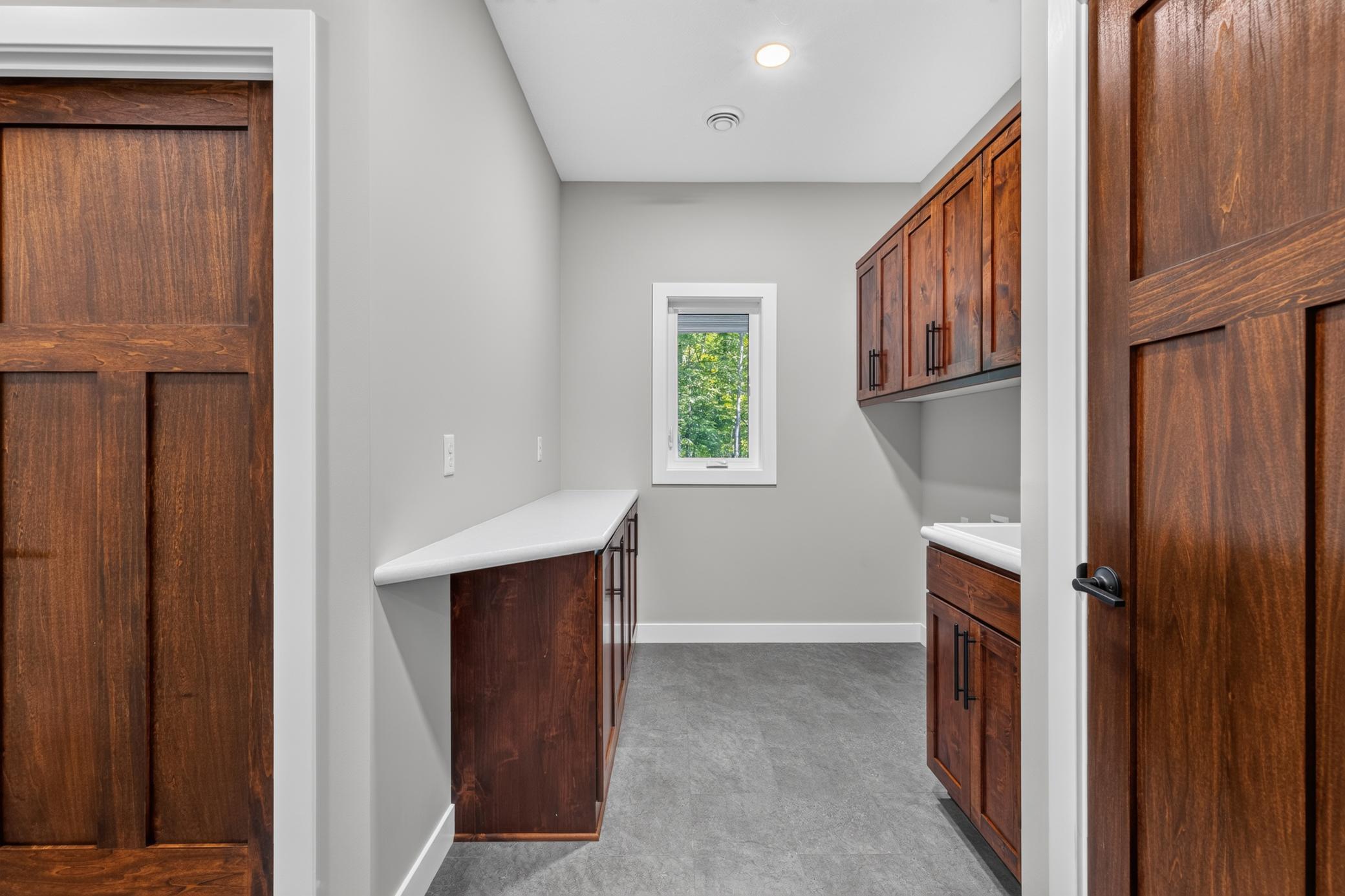There is a sliding pocket door to the laundry room