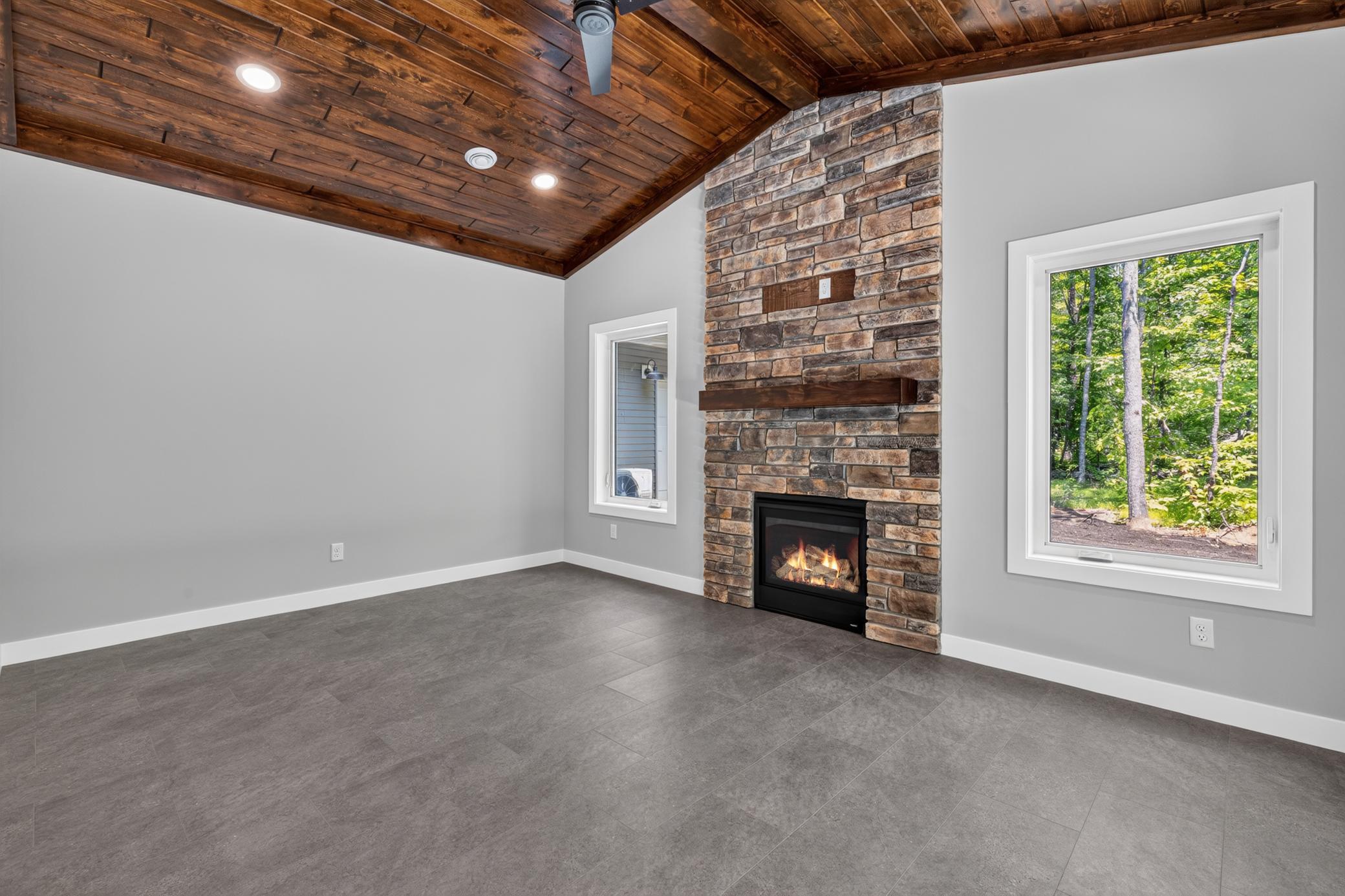 Four Season Porch featuring a gas burning fireplace and a Pine Tongue & Groove Ceiling