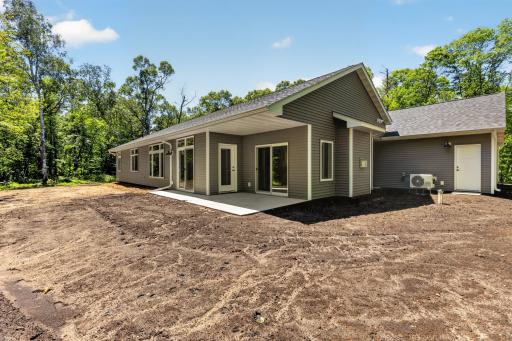 Covered patio that can be accessed from the dining room as well as the Four Season Porch. Perfect area for grilling or relaxing