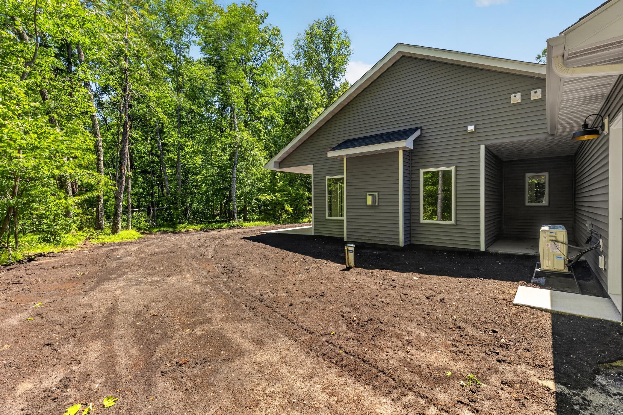 There is additional covered storage on the side of the house. Great spot to store your patio furnture