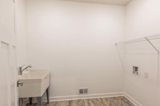 (Photo of similar home, features will vary) Conveniently located laundry.