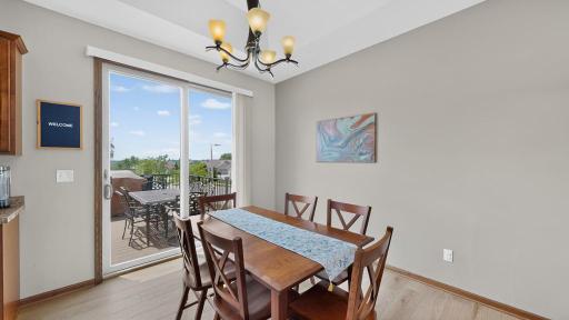 Dining area with 8' sliding door to composite deck