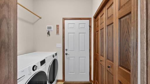 Main floor laundry, another large storage closet