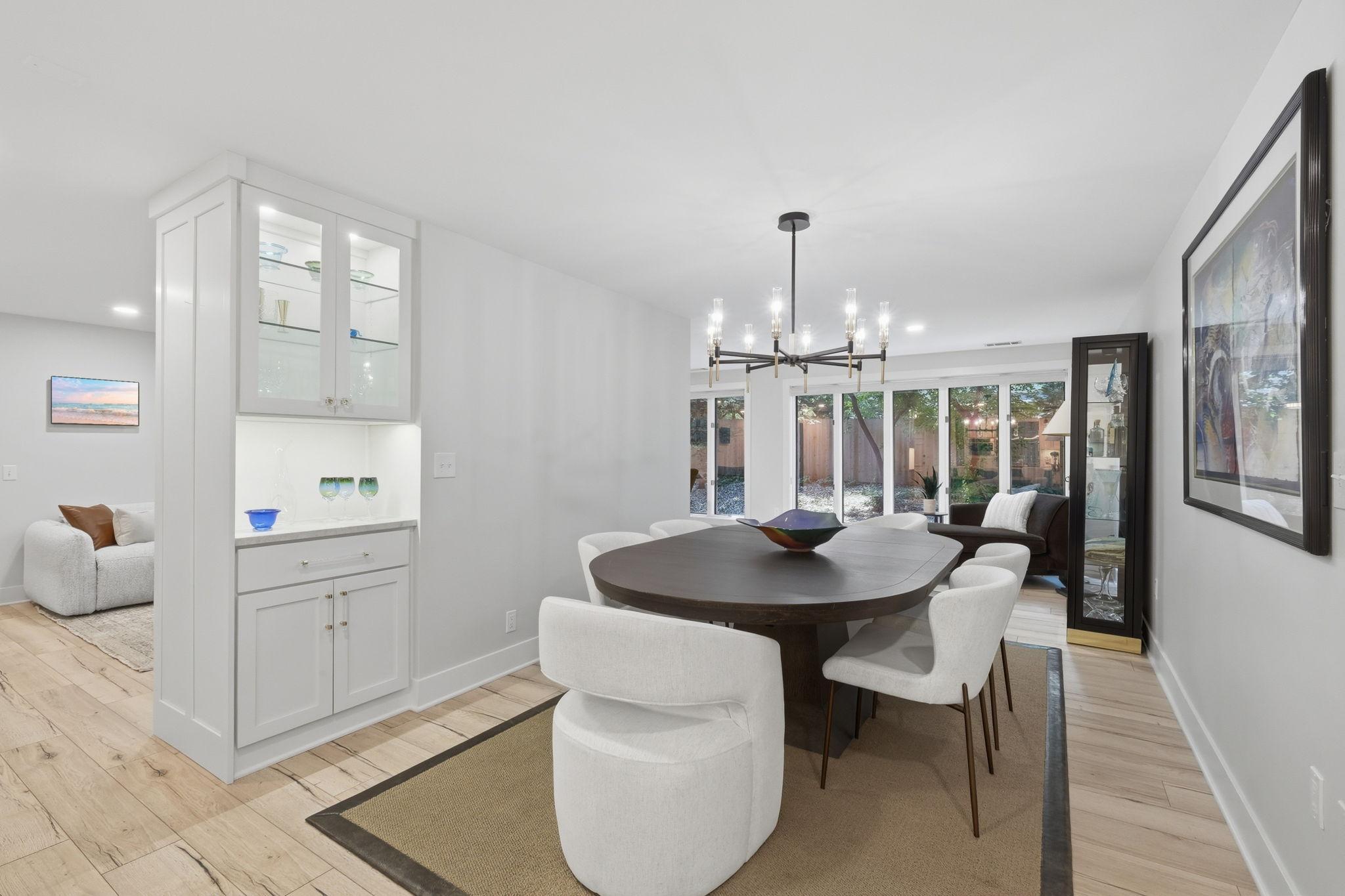 The large dining room includes a built-in bar area