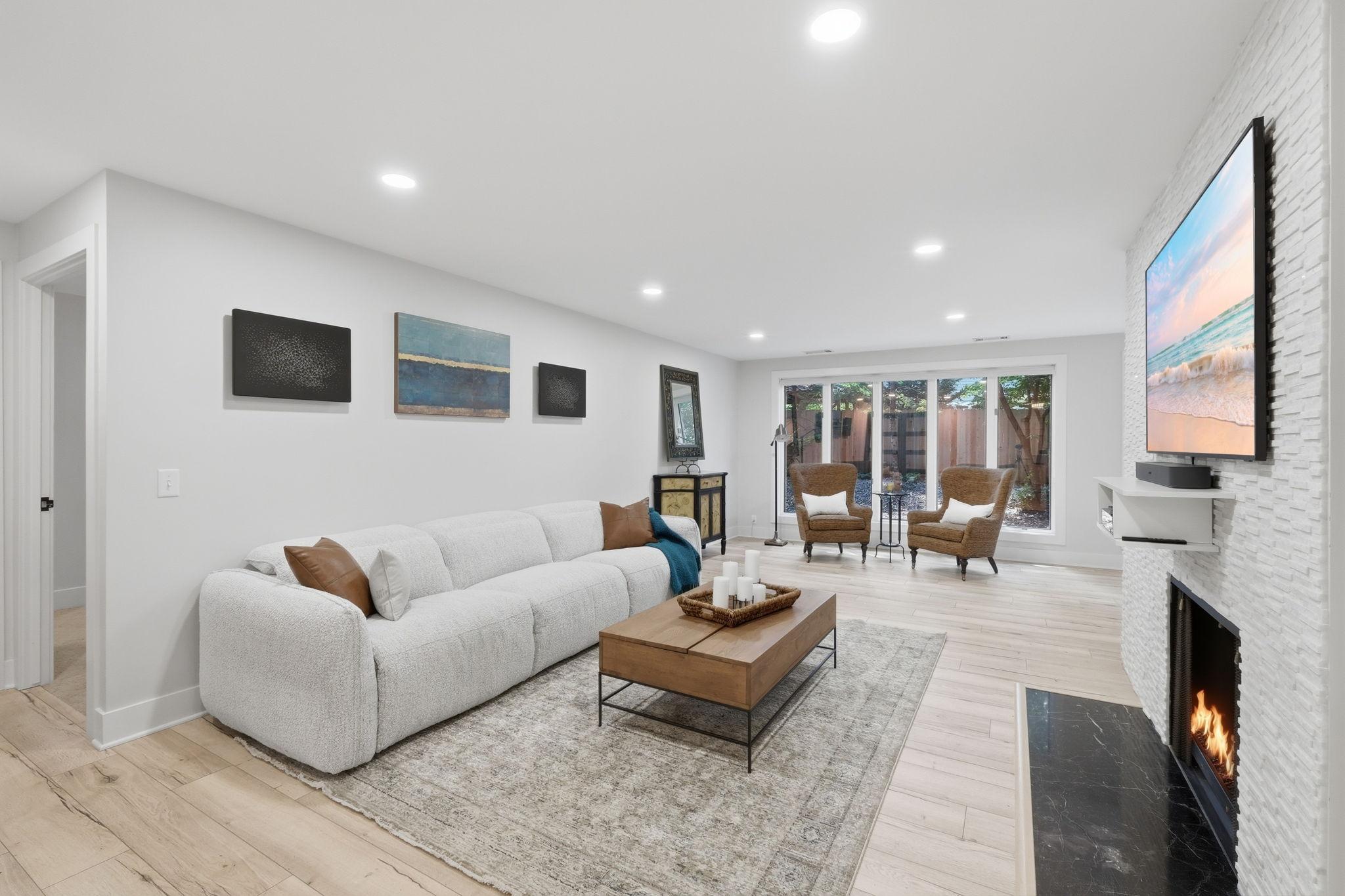 Versatile open floorplan- and all the amenities you could want, including this attractive fireplace