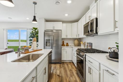 Photo is of a decorated model, colors and features will vary.