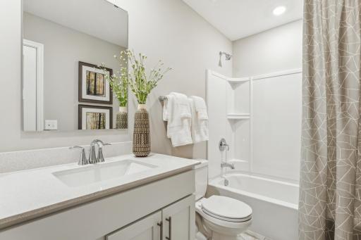 Photo is of a decorated model, colors and features will vary.