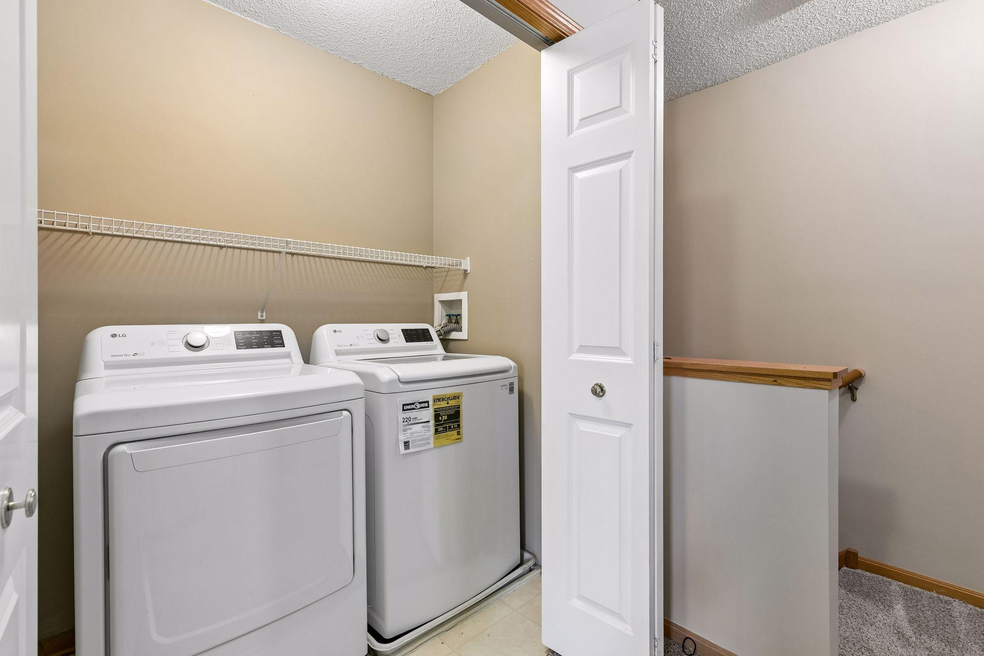 Upper level laundry with full-sized washer/dryer