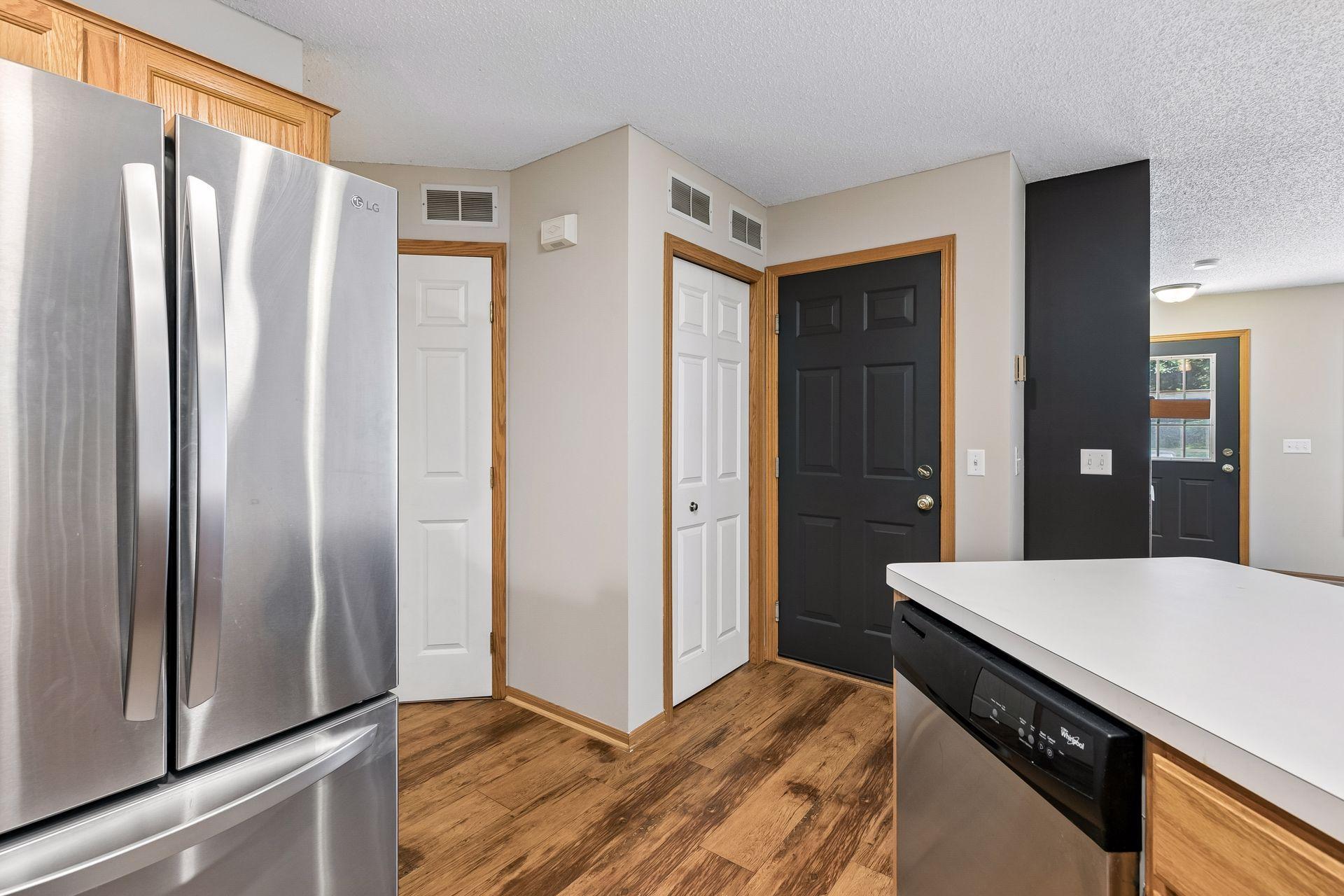 Access to garage, mechanical room and half bath