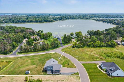 Situated on a 1.25-acre corner lot w/lake view!