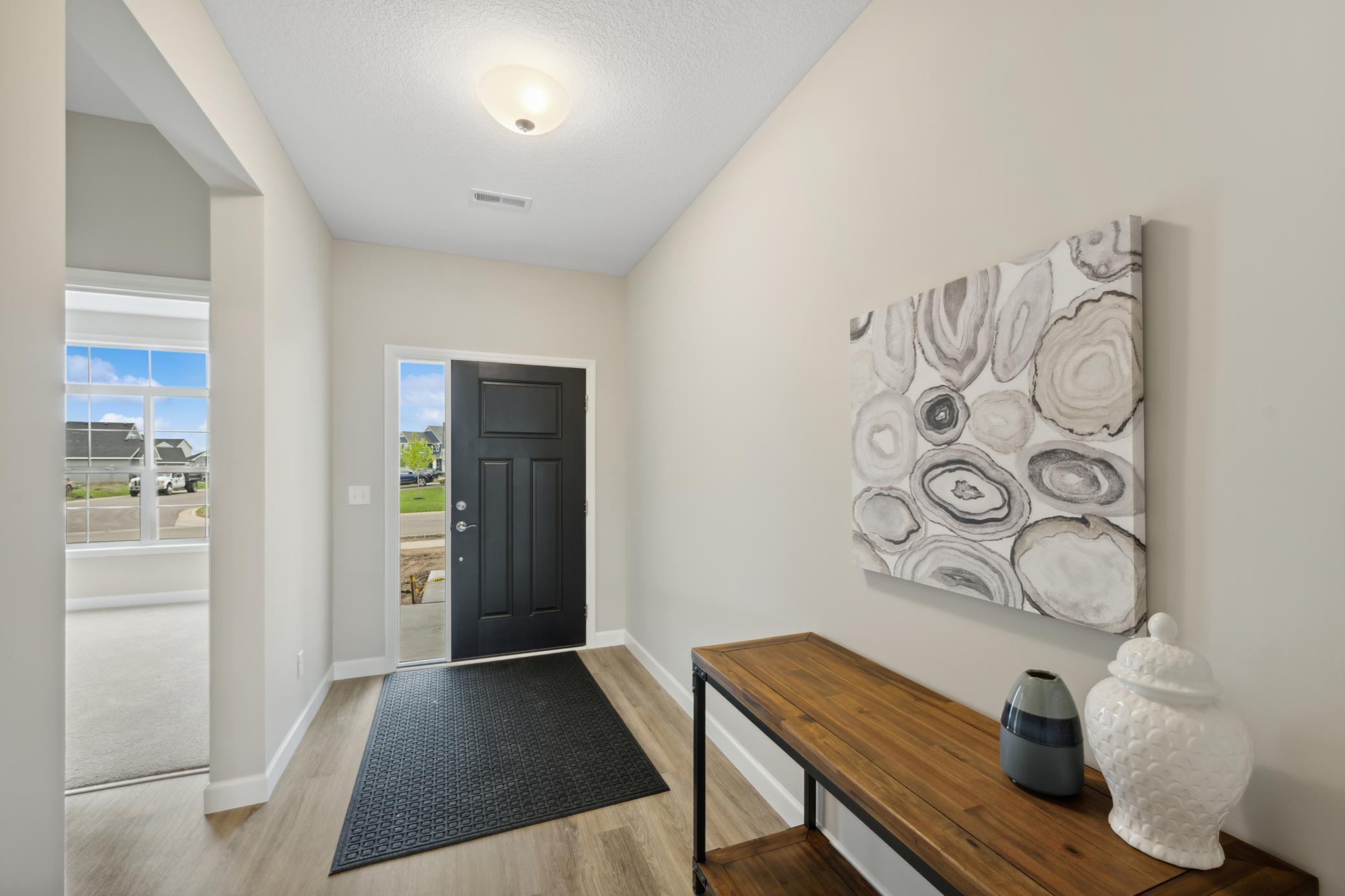 Entry - image is of a former model home for visual purposes.