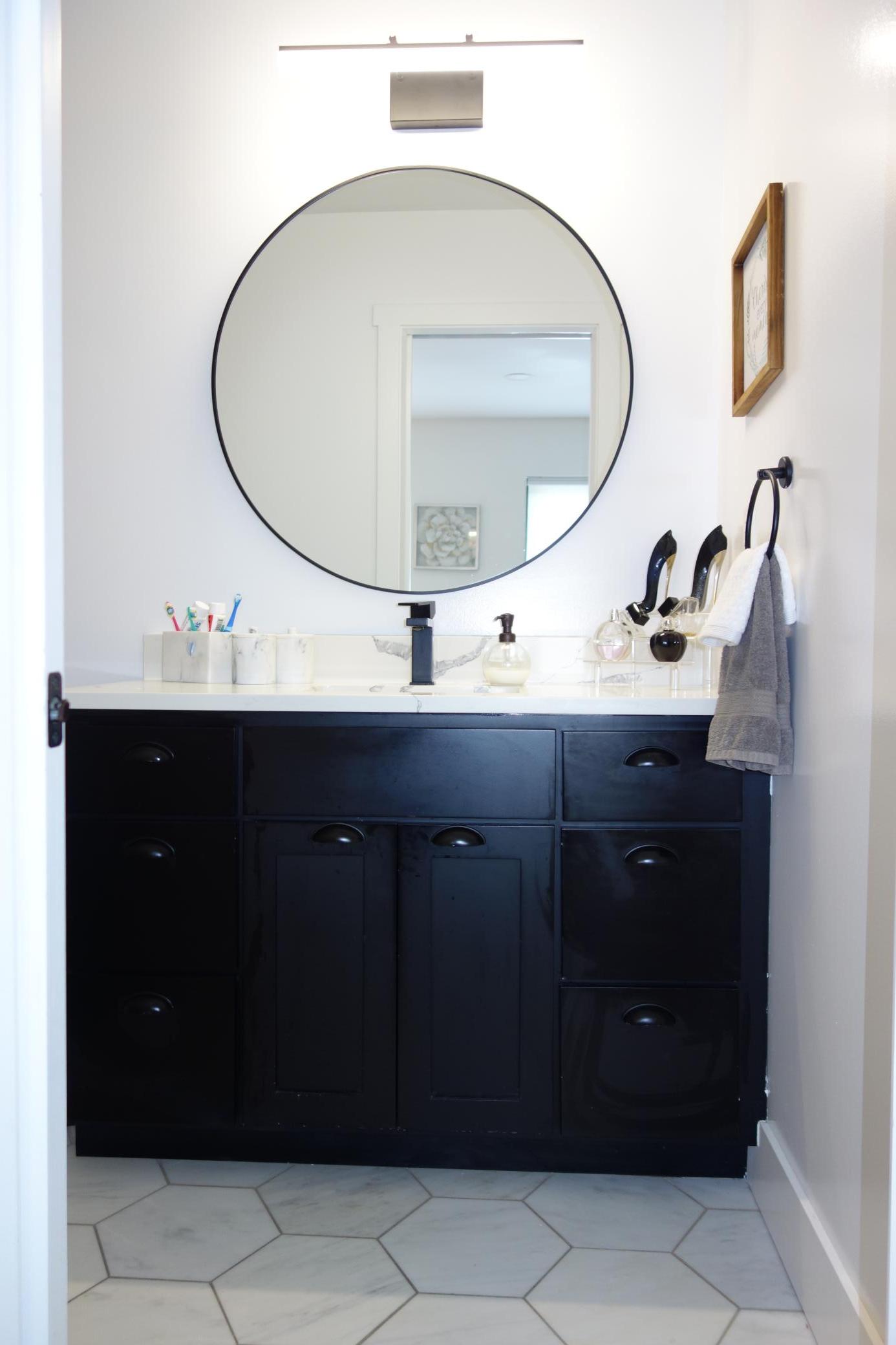 Quartz countertops and modern back cabinets.