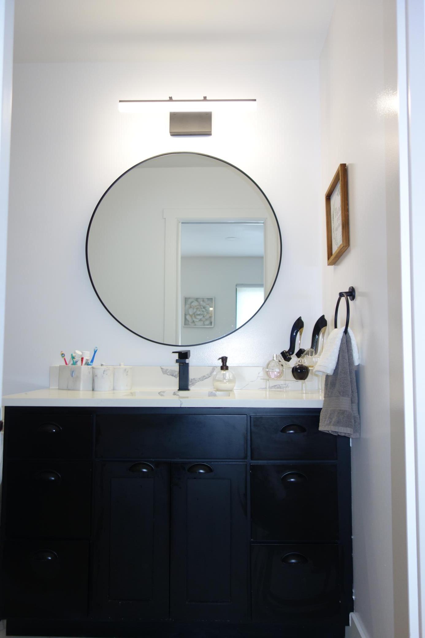 Stunning primary bath with walk-in shower.
