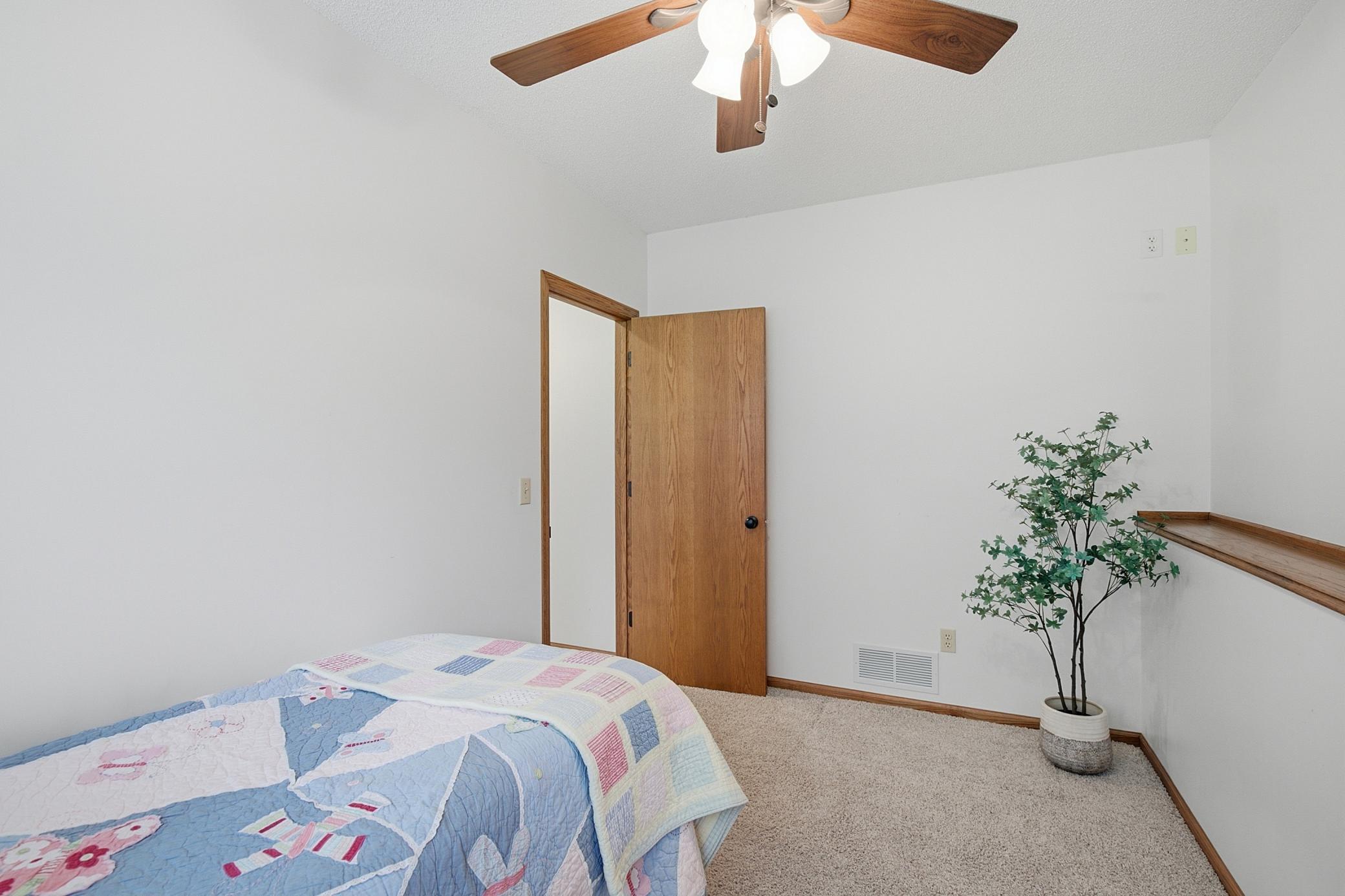 Fourth bedroom on the lower level does not offer a closet and would make a wonderful office!