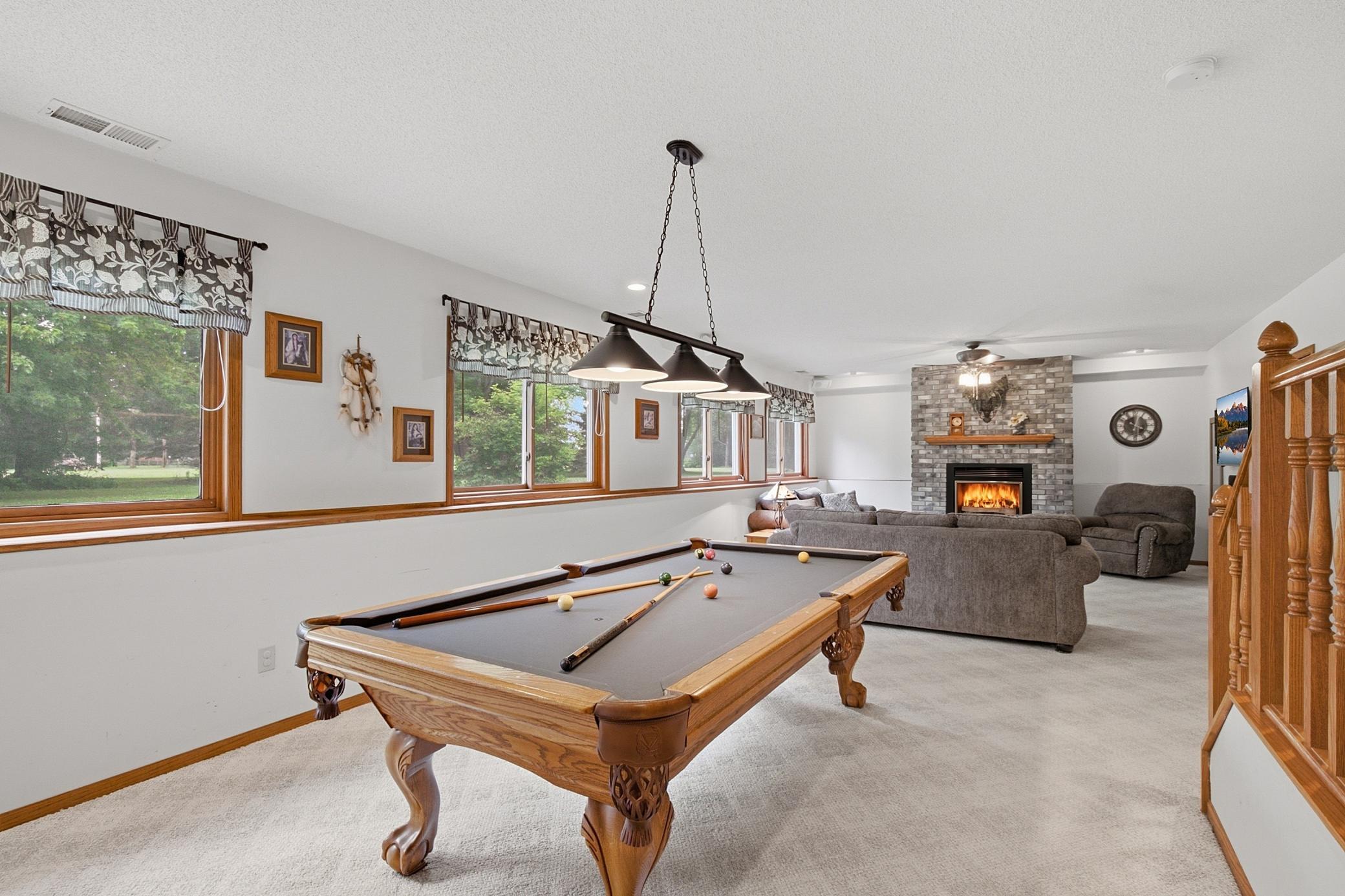 These windows and the elevation of the home really make you feel like you are not in a lower level!