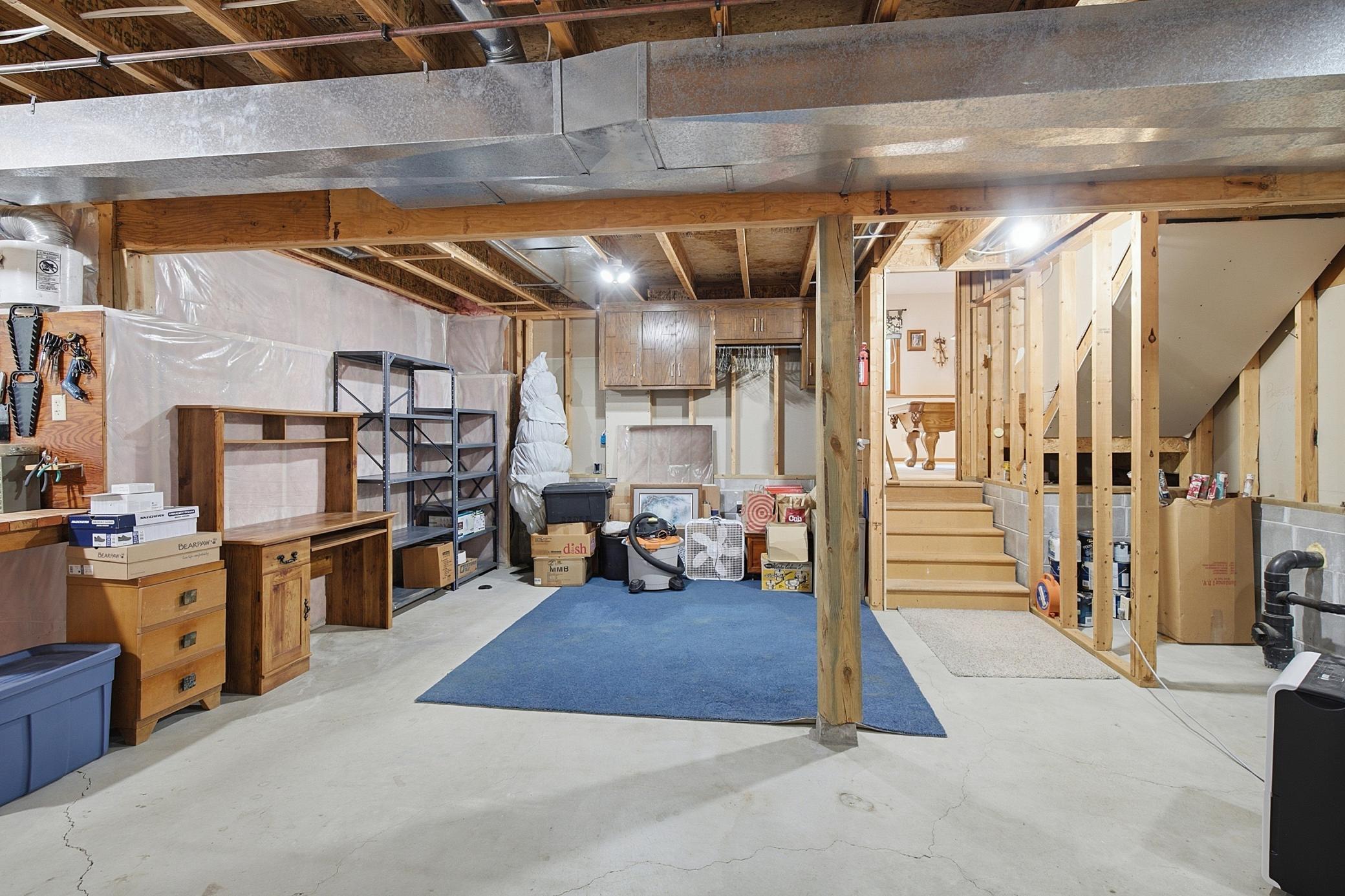 Basement remains unfinished and is the perfect place for working out, a workshop, crafting, or play.