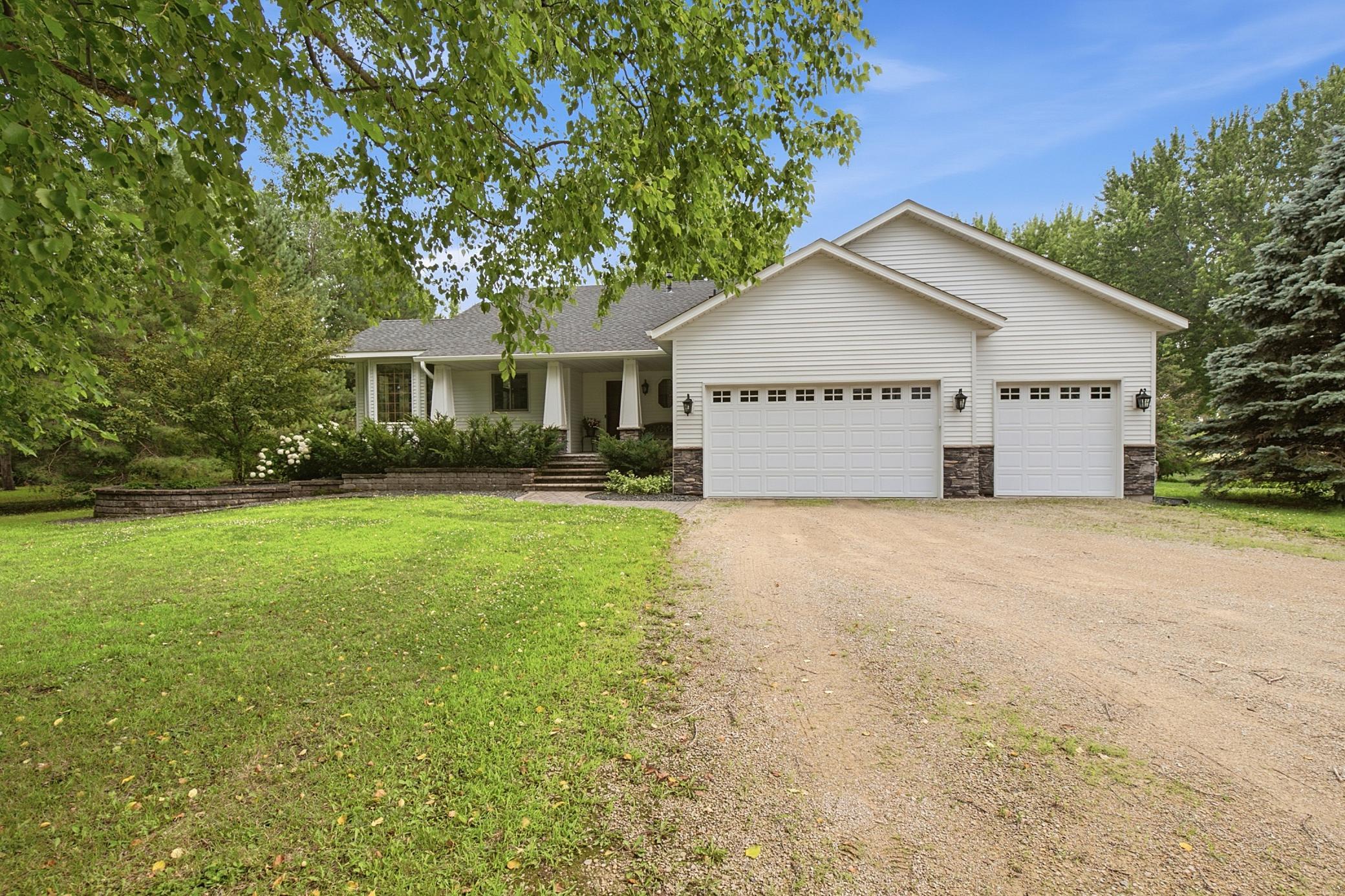 Solid home built on FIVE acres with renovated Kitchen and baths.