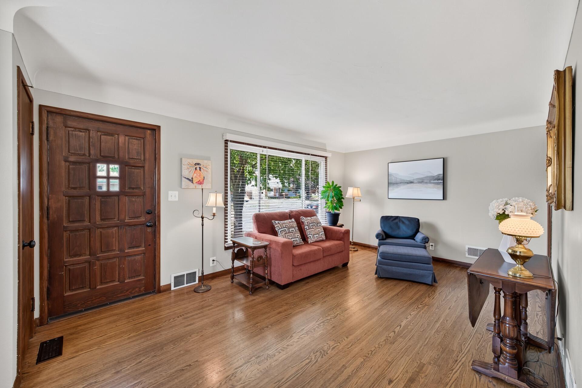 Come on in and take a look around. Upon entry from front door you have a generous size living room with a HUGE window brining in so much light!